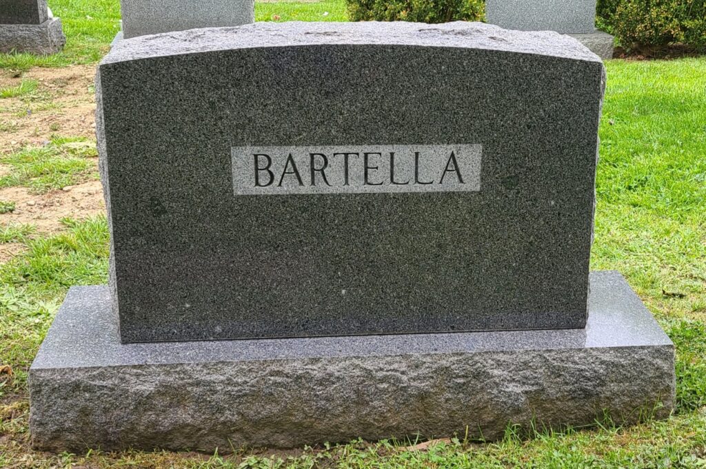 after photo showing headstone completely clean and treated against growths