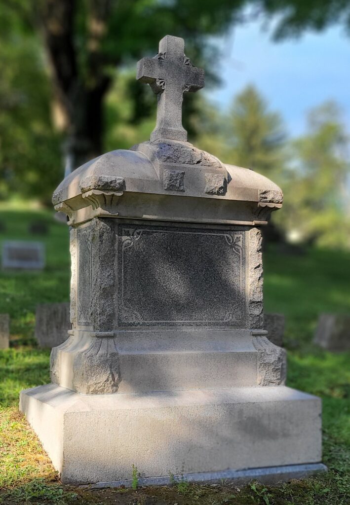 Bold and Clean headstone with cross after strong cleaning